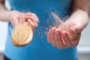 Hair strands on a brush